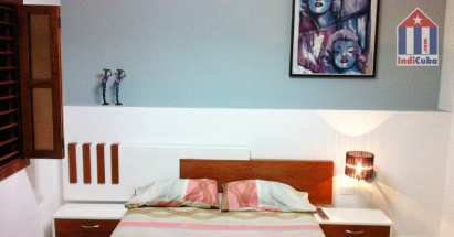 The double bed in this spacious room