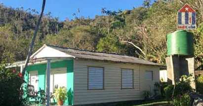 Bellamente enmarcado por el paisaje único aquí en el valle de Viñales