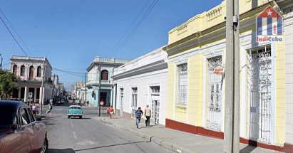 View into the street. At the end the Paseo of Cienfuegos leads along