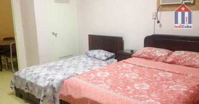El dormitorio de la casa de Gladis cuenta con una cama doble y una personal