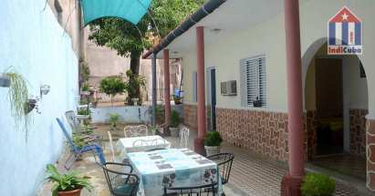 Nice patio with tables and chairs to eat and relax