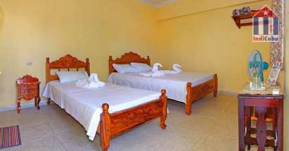 The room is quite spacious and has 2 beds: 1 x double + 1 x single bed