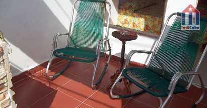 One room has a private balcony and the other a terrace