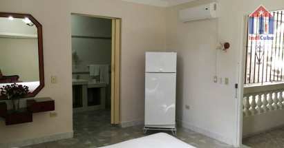 It's this well equipped and comfortable room with its private bathroom attached
